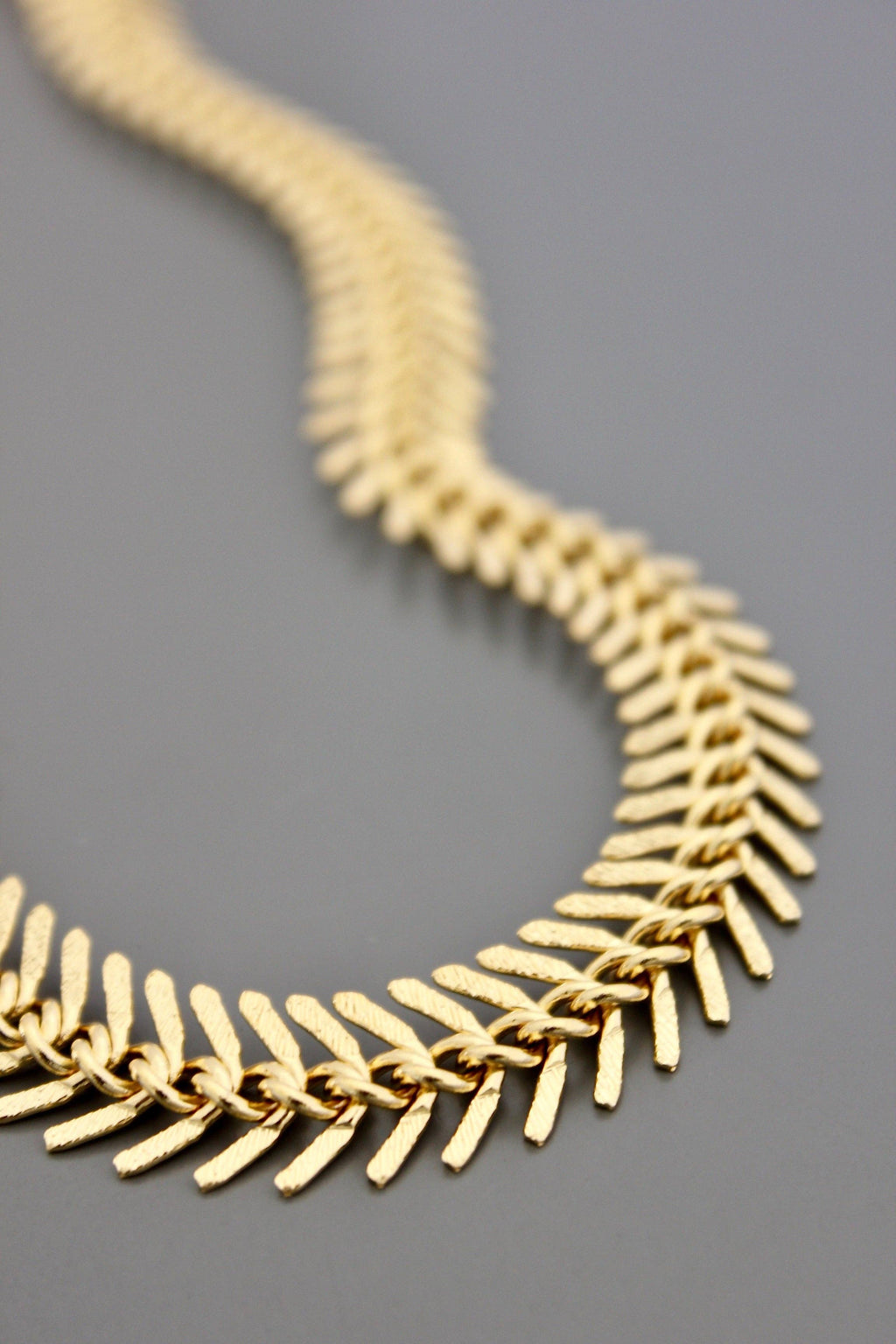 18k matte gold fish bone necklace